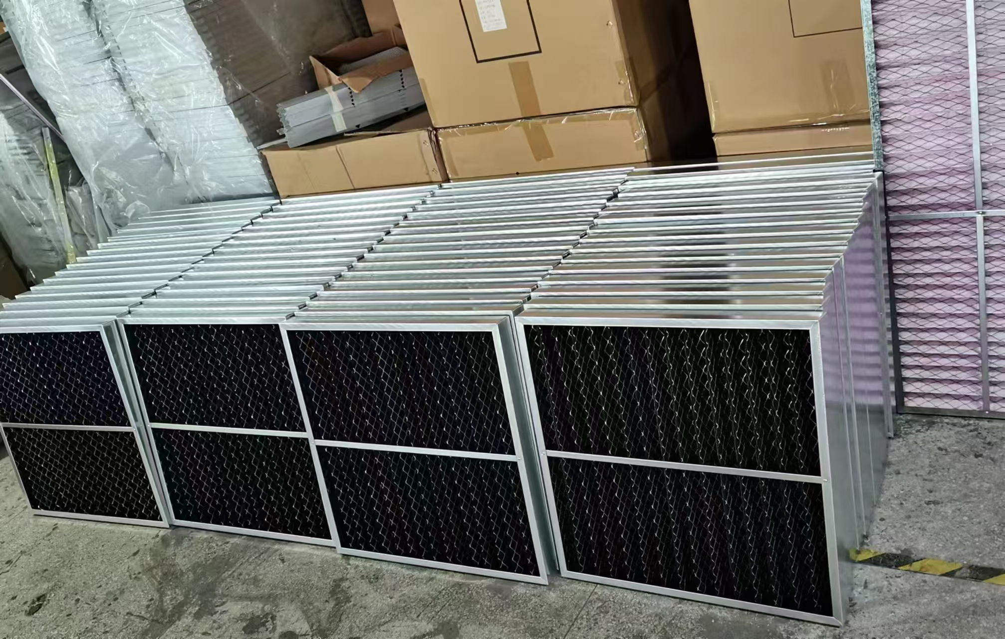 Activated carbon air filter assembly and finished panels